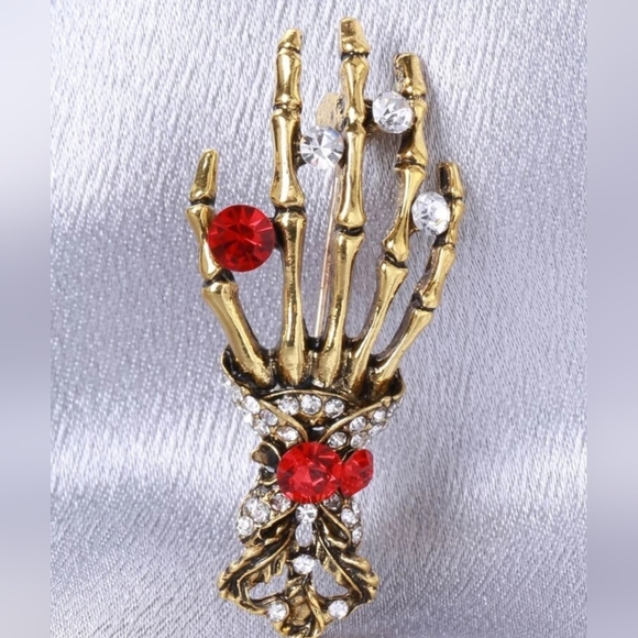 Gold plated red and white crystal skeleton hand necklace/brooch - Picture 2 of 11